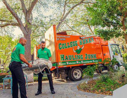 college hunks hauling junk does all the heavy lifting