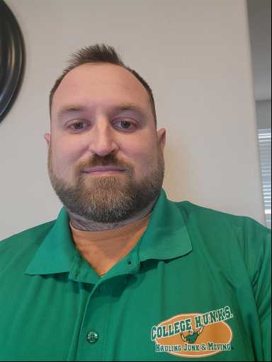 Dustin Hughes headshot.