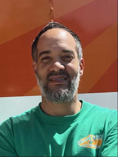 Miguel Adrianza headshot.
