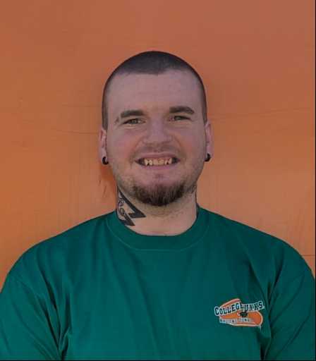 Derrik M. headshot.