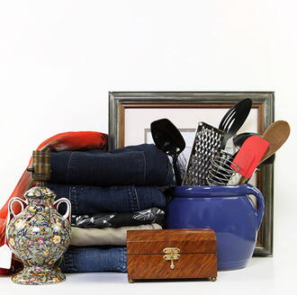 items to donate via junk removal service includes clothing, kitchen gadgets, and decorative items